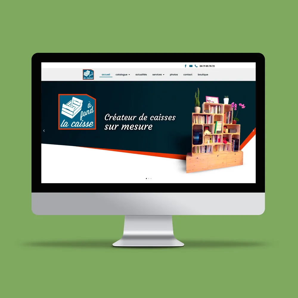 Ordinateur vue de face montrant le site de l'artisan À fond la caisse